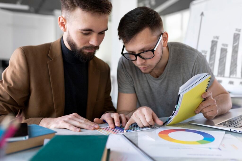 The current image has no alternative text. The file name is: men-analyzing-graph-together-work-scaled.jpg